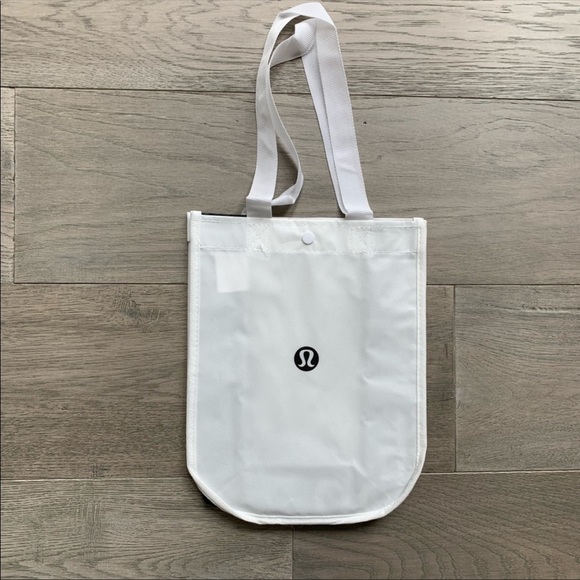 lululemon athletica Handbags - Lululemon small white reusable shopping tote bag